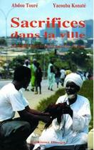 Couverture du livre « Sacrifices dans la ville ; le citadin chez le devin en Côte d'Ivoire » de Abdou Toure et Yacouba Konate aux éditions Sepia
