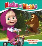 Couverture du livre « Masha et Michka ; Masha fait du vélo » de  aux éditions Hachette Jeunesse