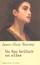 Couverture du livre « Un feu brûlait en elles » de Jean-Guy Soumy aux éditions Robert Laffont